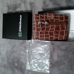 *IDENTITY STRONGHOLD* BROWN EMBOSSED/LEATHER FEEL.LIKE  A MINI-PURSE.BRAND NEW!☆